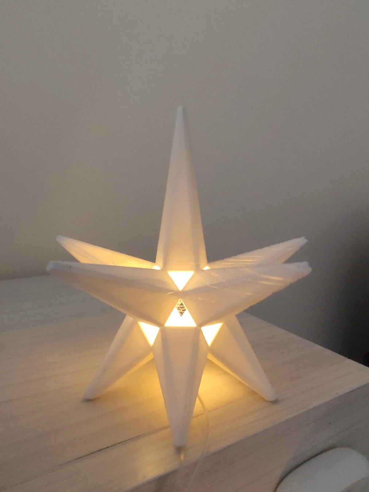 Estrella de Navidad impresa, fotografía del diseño de Titun
